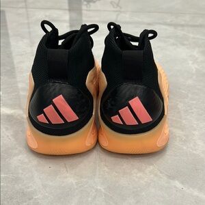 adidas Black and Orange Sneakers with Stretchy Knit Upper and Thick Rubber Sole